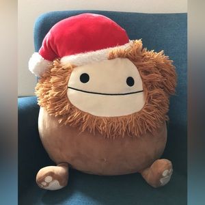 Benny the Bigfoot Squishmallow with Santa hat